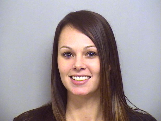 Arrested for violating her community control after a sentence for obtaining a co
