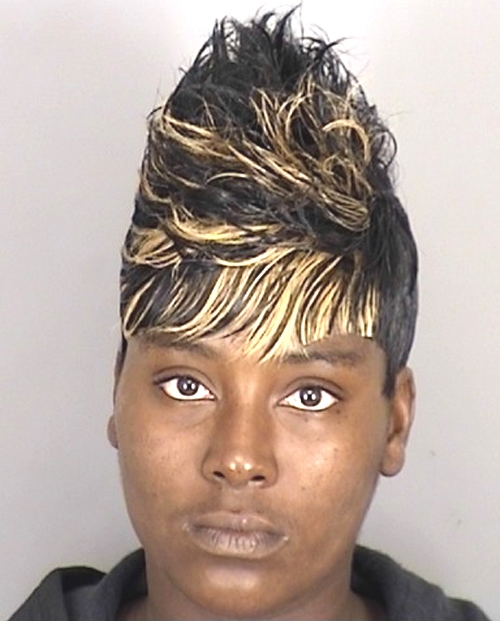 Photographed by the sheriff as part of her criminal registration.