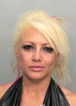 Arrested for battery, resisting an officer, and disorderly conduct.