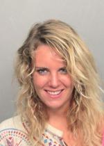 Arrested for cocaine possession, loitering, and resisting an officer.