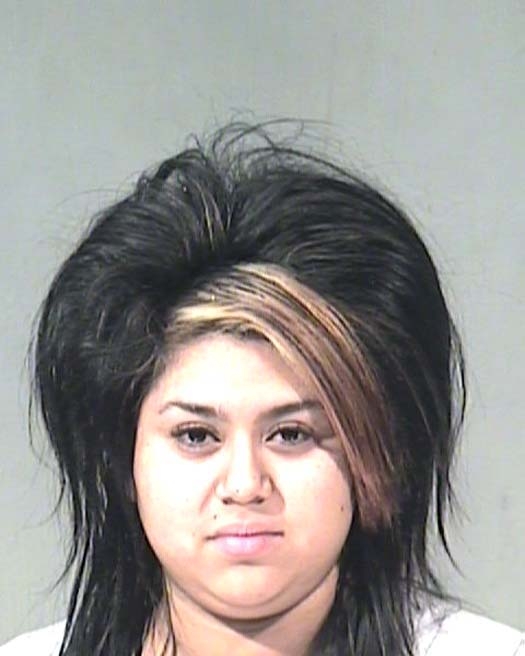 Arrested for shoplifting.